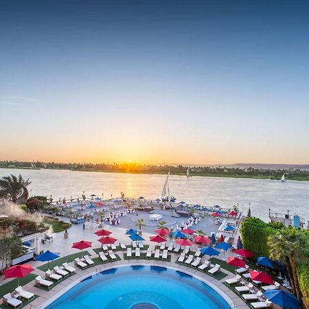 לוקסור Sonesta St. George Hotel - Convention Center מראה חיצוני תמונה Sunset at the pool