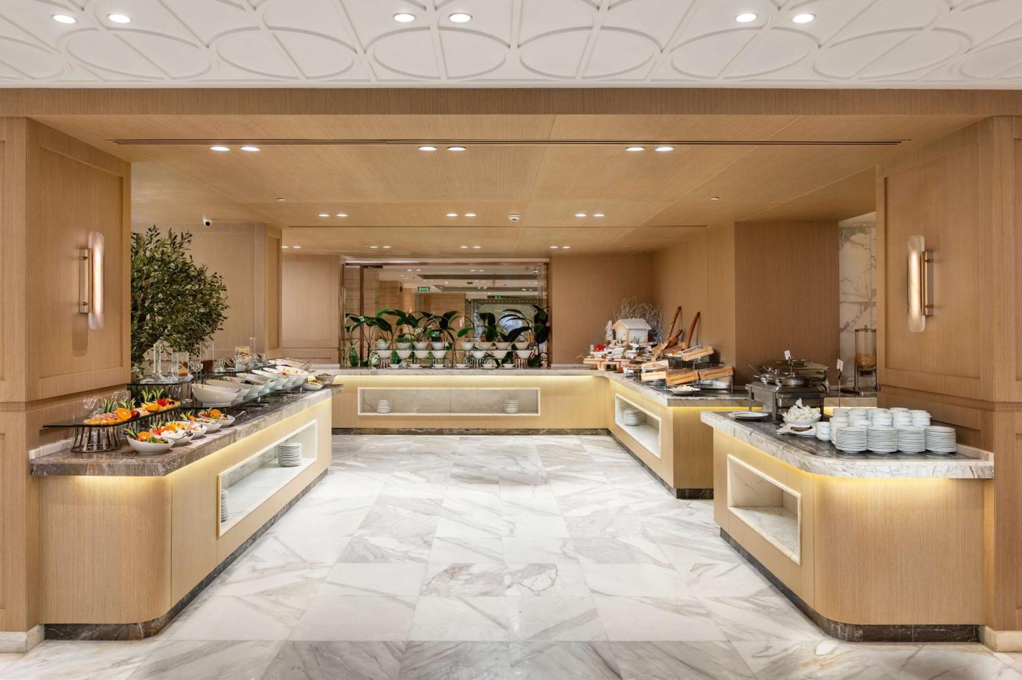 לוקסור Sonesta St. George Hotel - Convention Center מראה חיצוני תמונה The buffet at the lounge